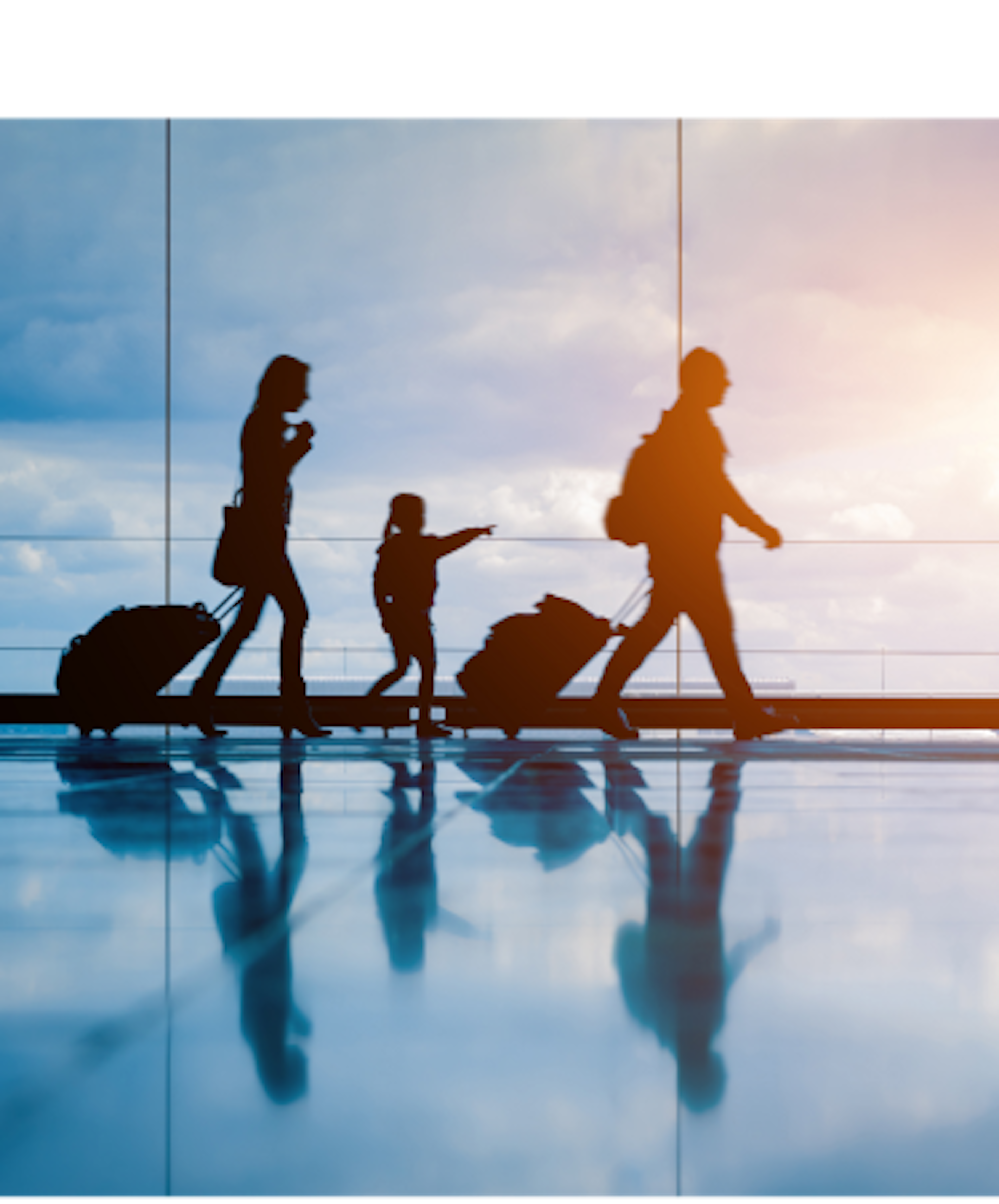 Silhouetted figures of a family with luggage walking in an airport terminal, with a plane taking off against a vibrant sunset in the background.